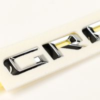 Emblem seitlich an der Tür *Grand Cherokee*